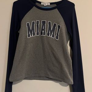 Two long sleeve Bird and Stone graphic tops.